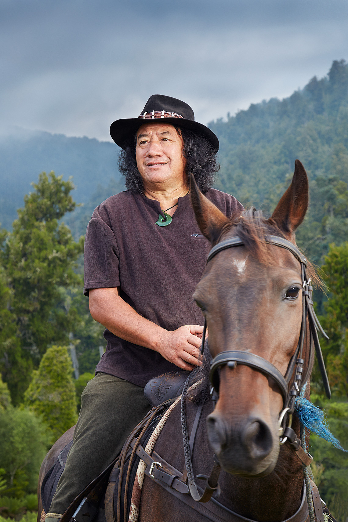 Richard White of Ahurerei Adventures with horse in Urewera mountains